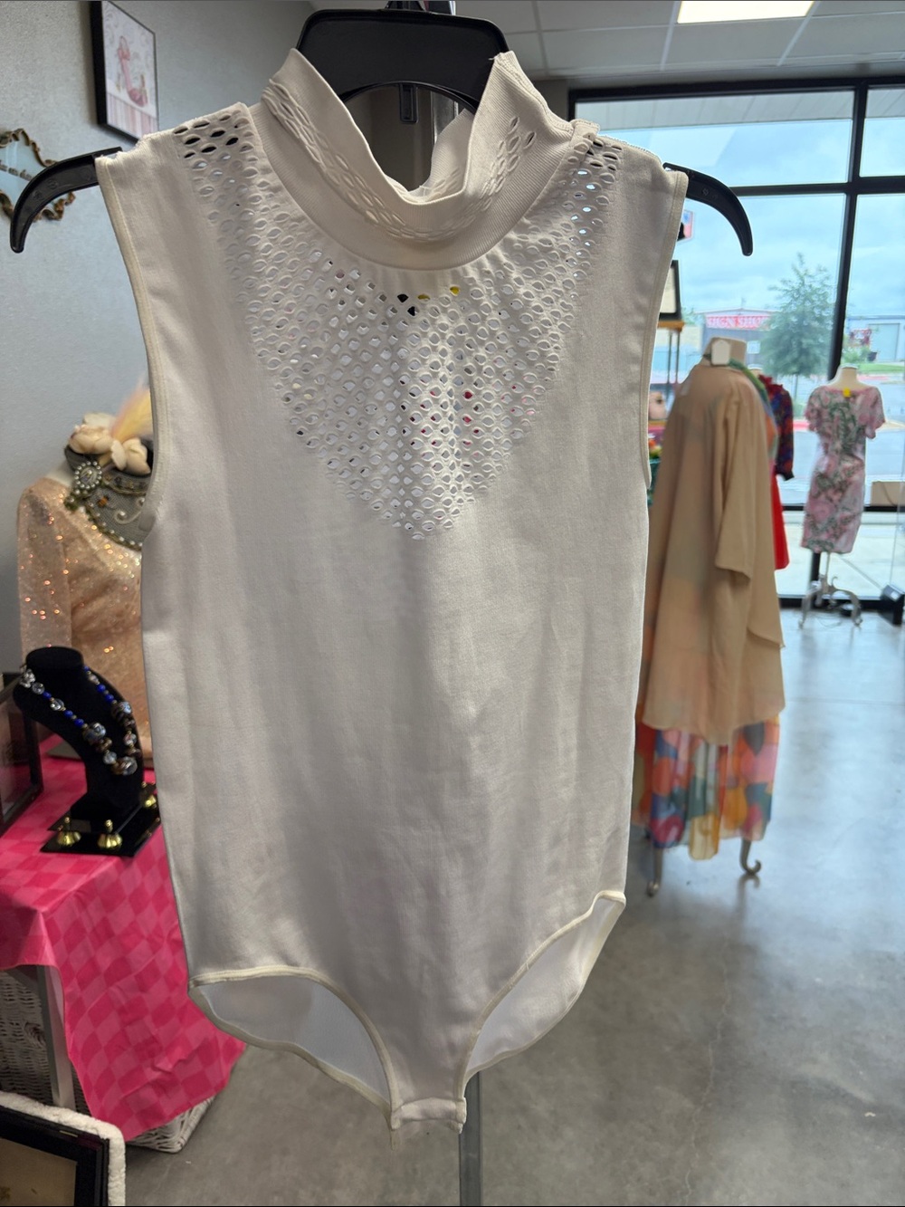 Sleeveless Cream Mock Neck Bodysuit with Eyelet Panel